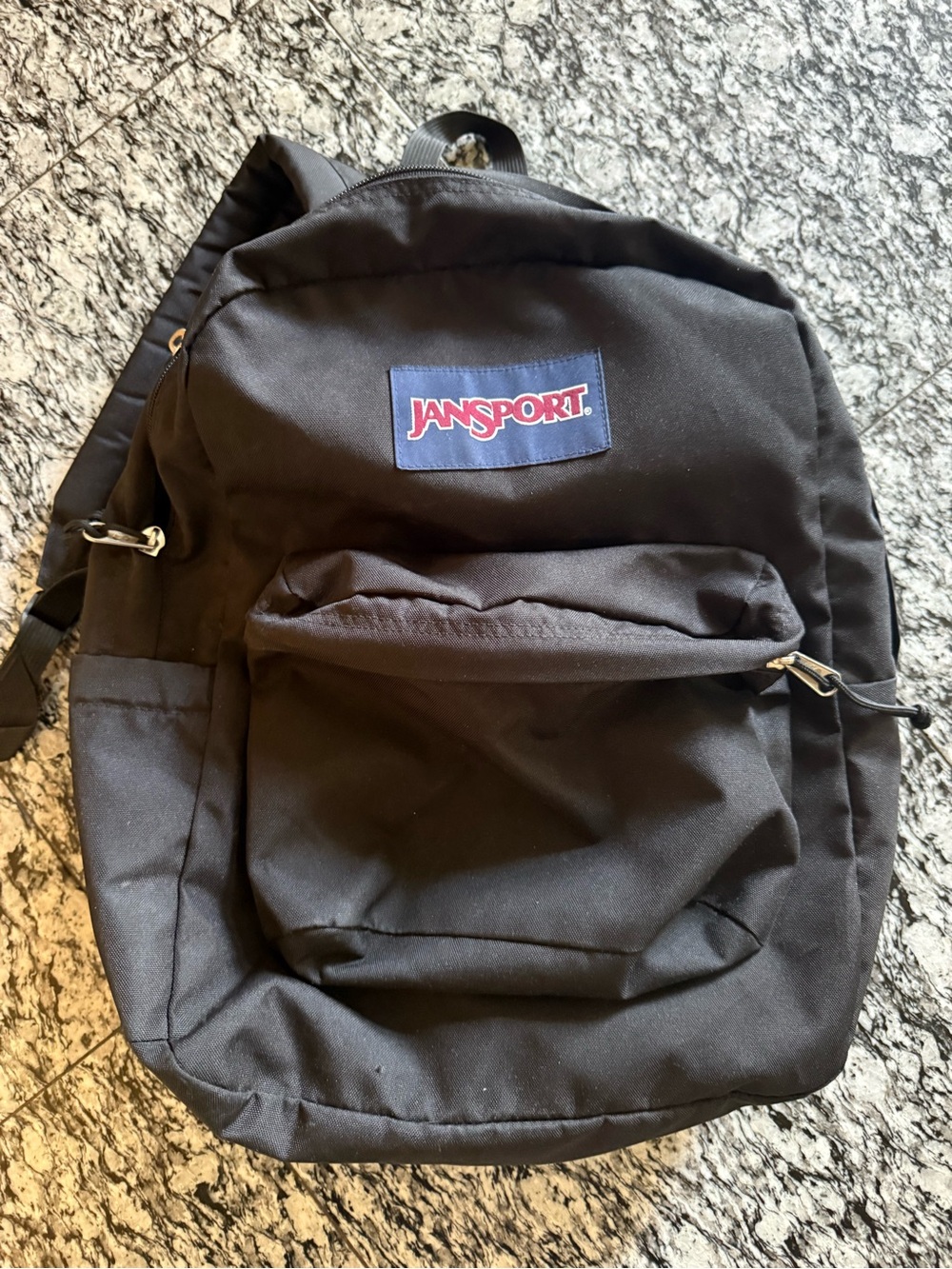 Jansport Black Backpack with Navy Logo Patch
